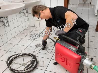 با زکردن لوله با فنر برقی